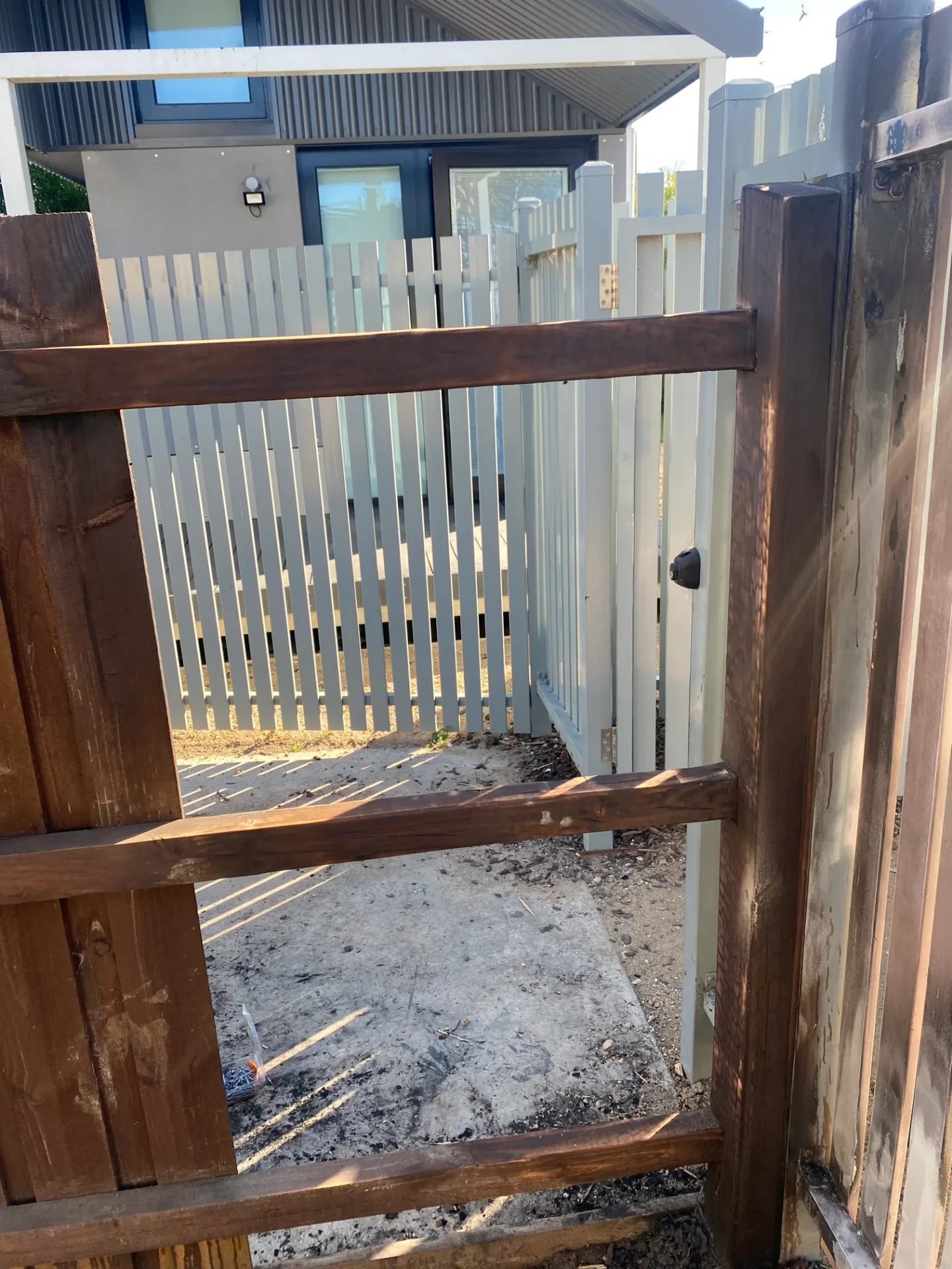 Residential gate repair and maintenance work in progress